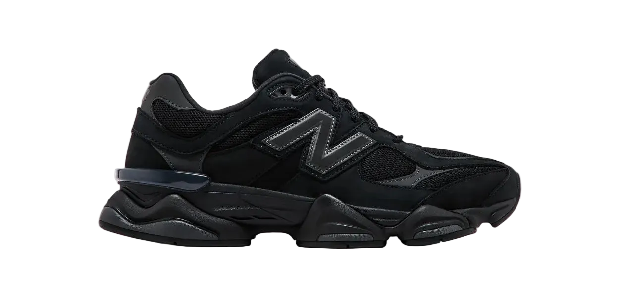 Black sneaker with a prominent brand logo on a white background
